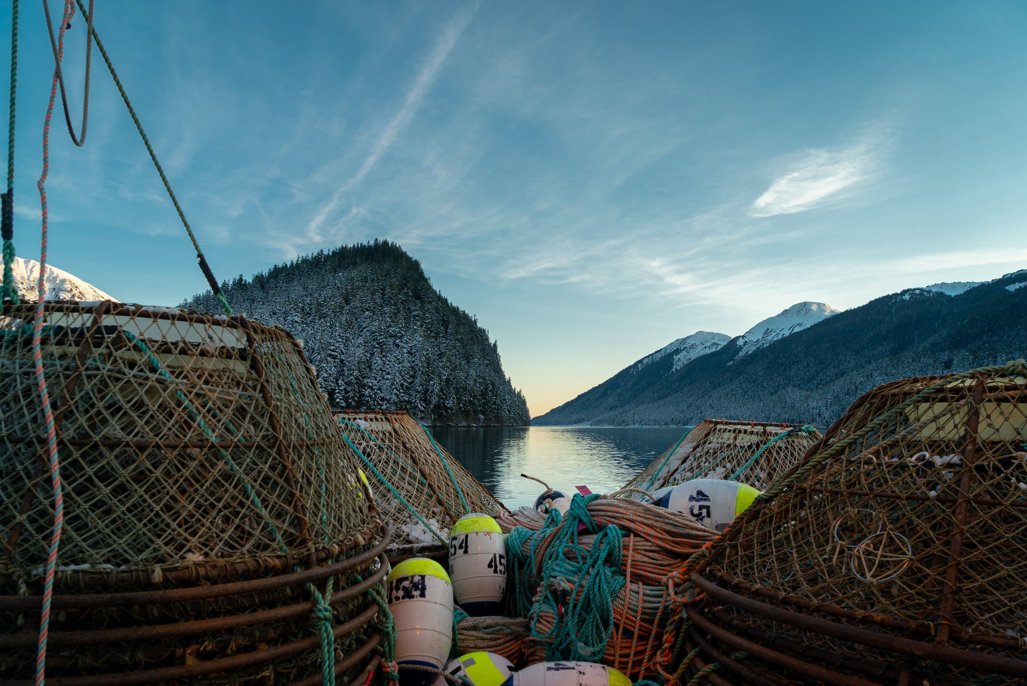 crab pots on the deck of a fishing boat in alaska