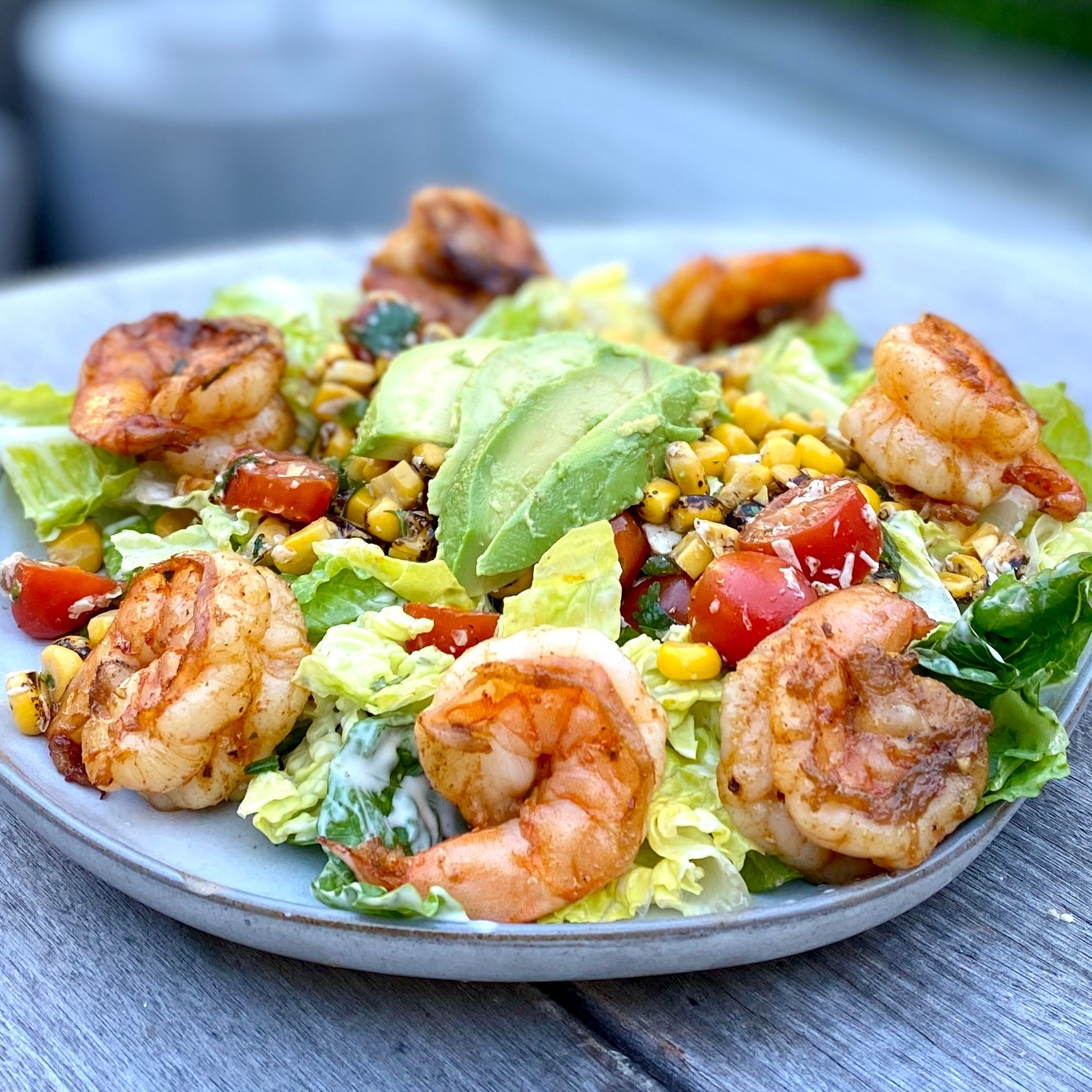 delicious southwest salad with grilled prawns and avocado