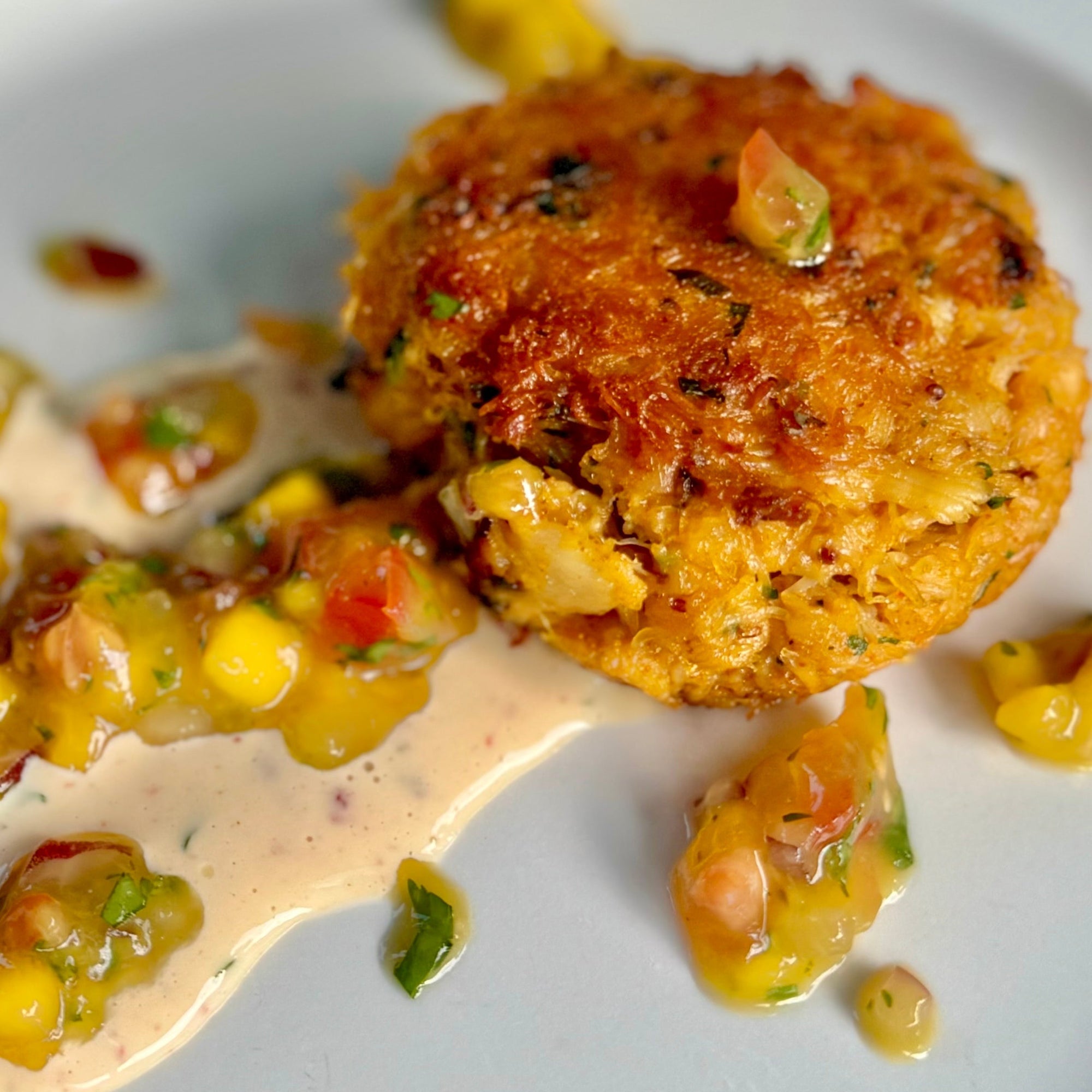 delicious tandoori crab cakes with a mango salsa and homemade spicy may