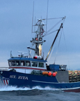 Fishing vessel in Alaska with crab pots