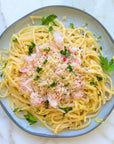 Snow crab meat on top of pasta