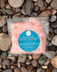 Wild Oregon shrimp in package on top of rocks