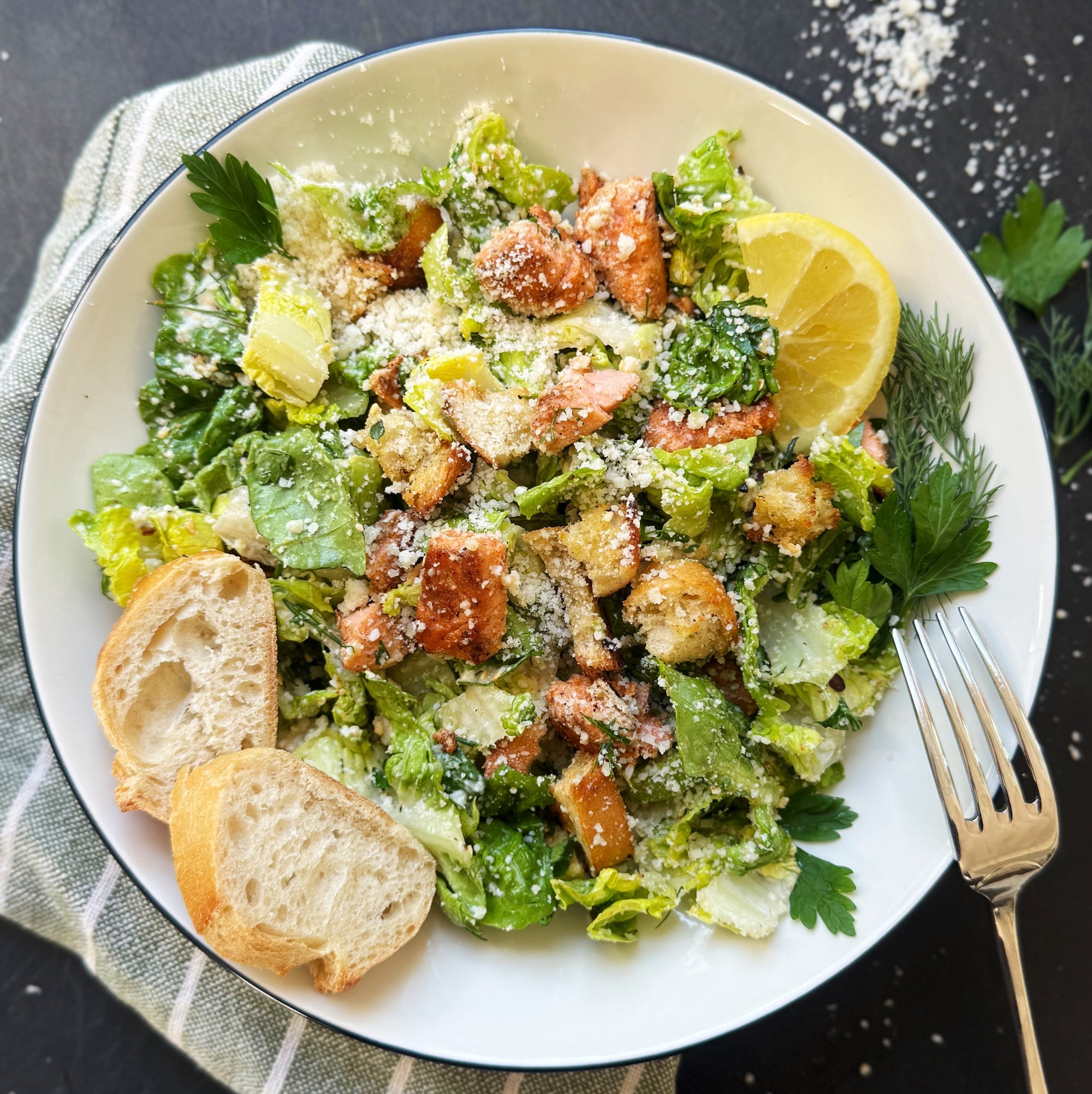 delicious blackened salmon caesar salad on a plate