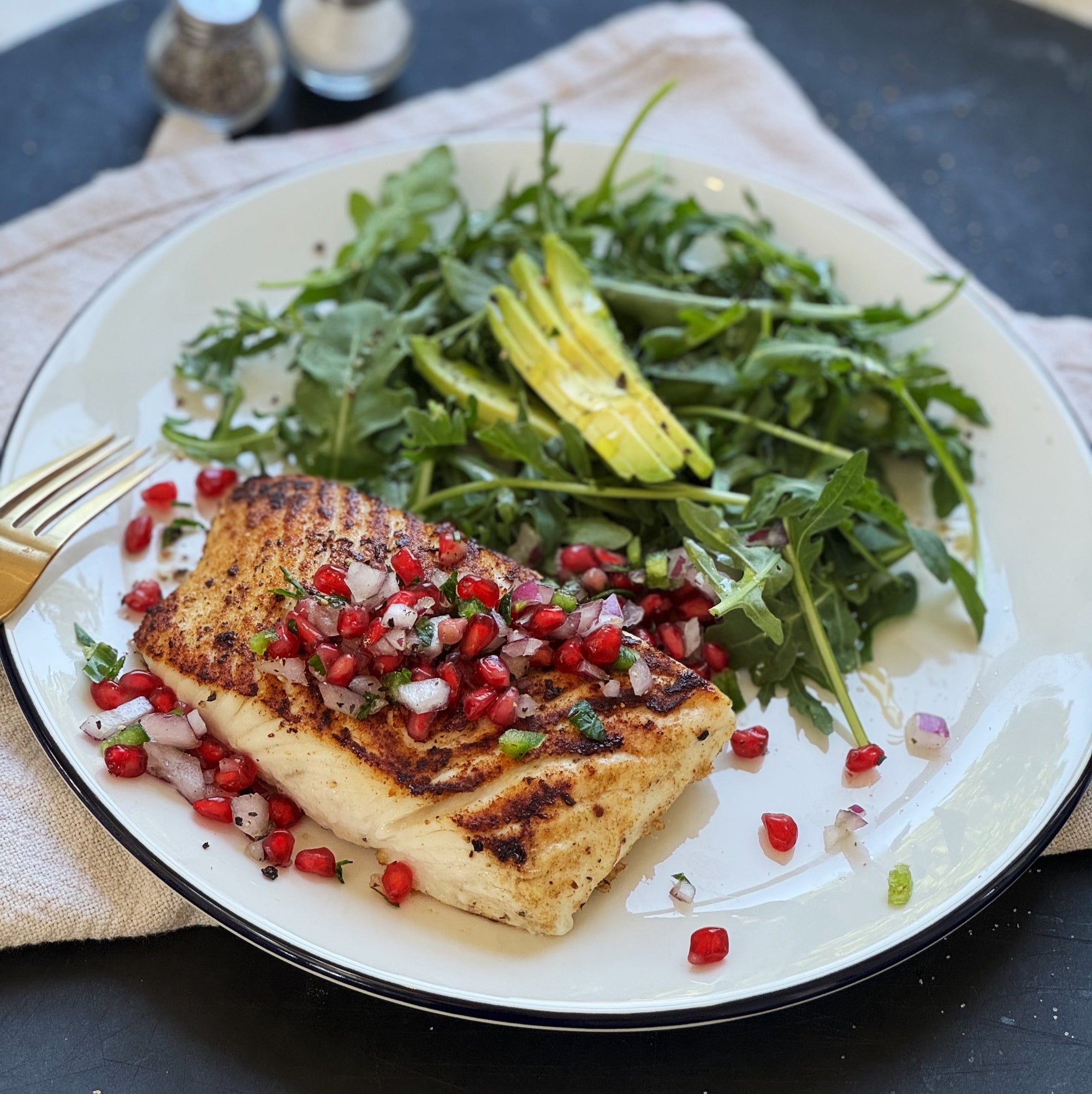 pan seared halibut with pomegranate salsa and salad