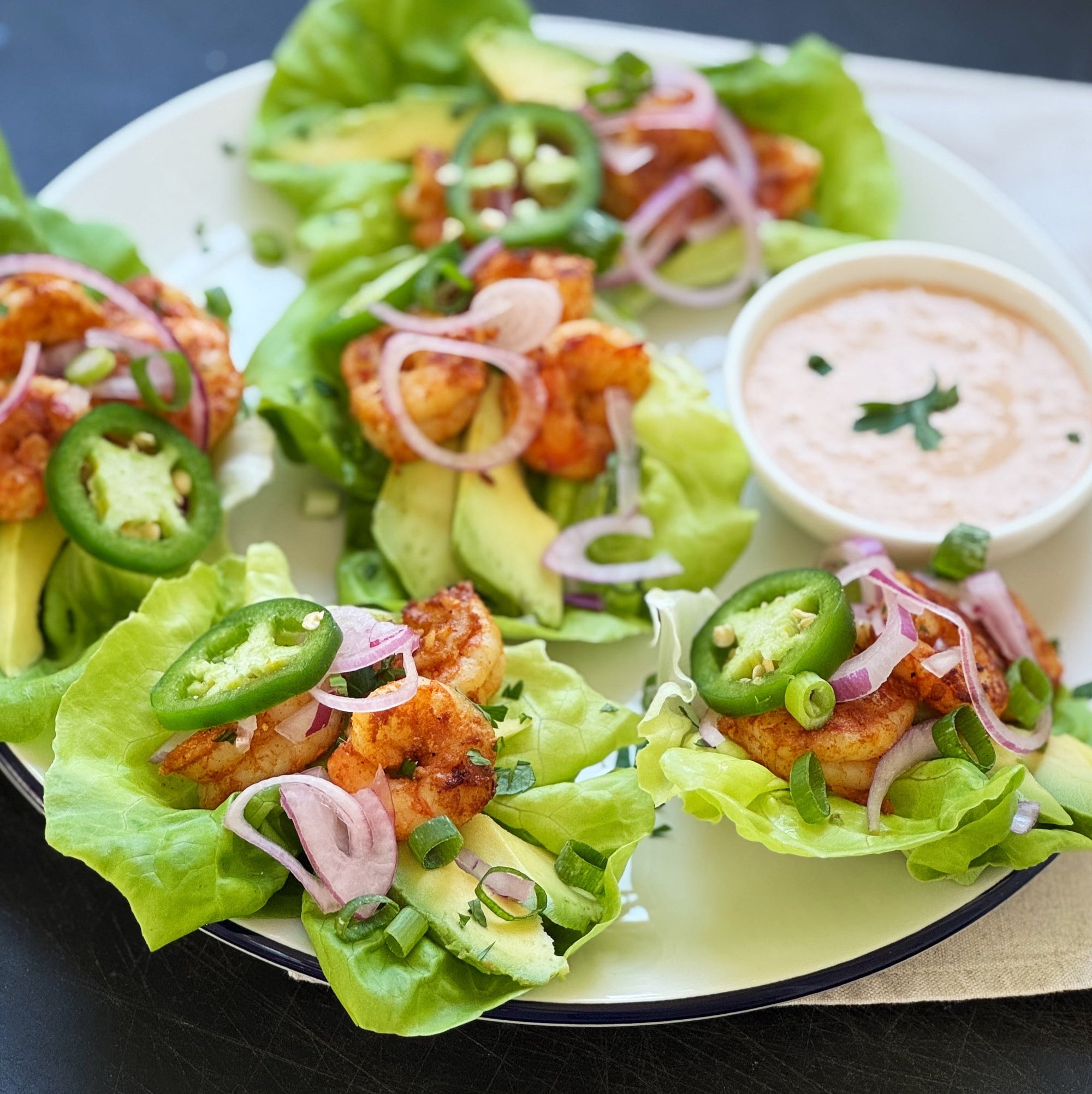 southwest shrimp lettuce cups with avocado and jalapenos