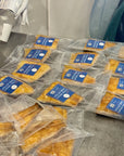 Vacuum sealed wild Alaska smoked sablefish portions during packaging process