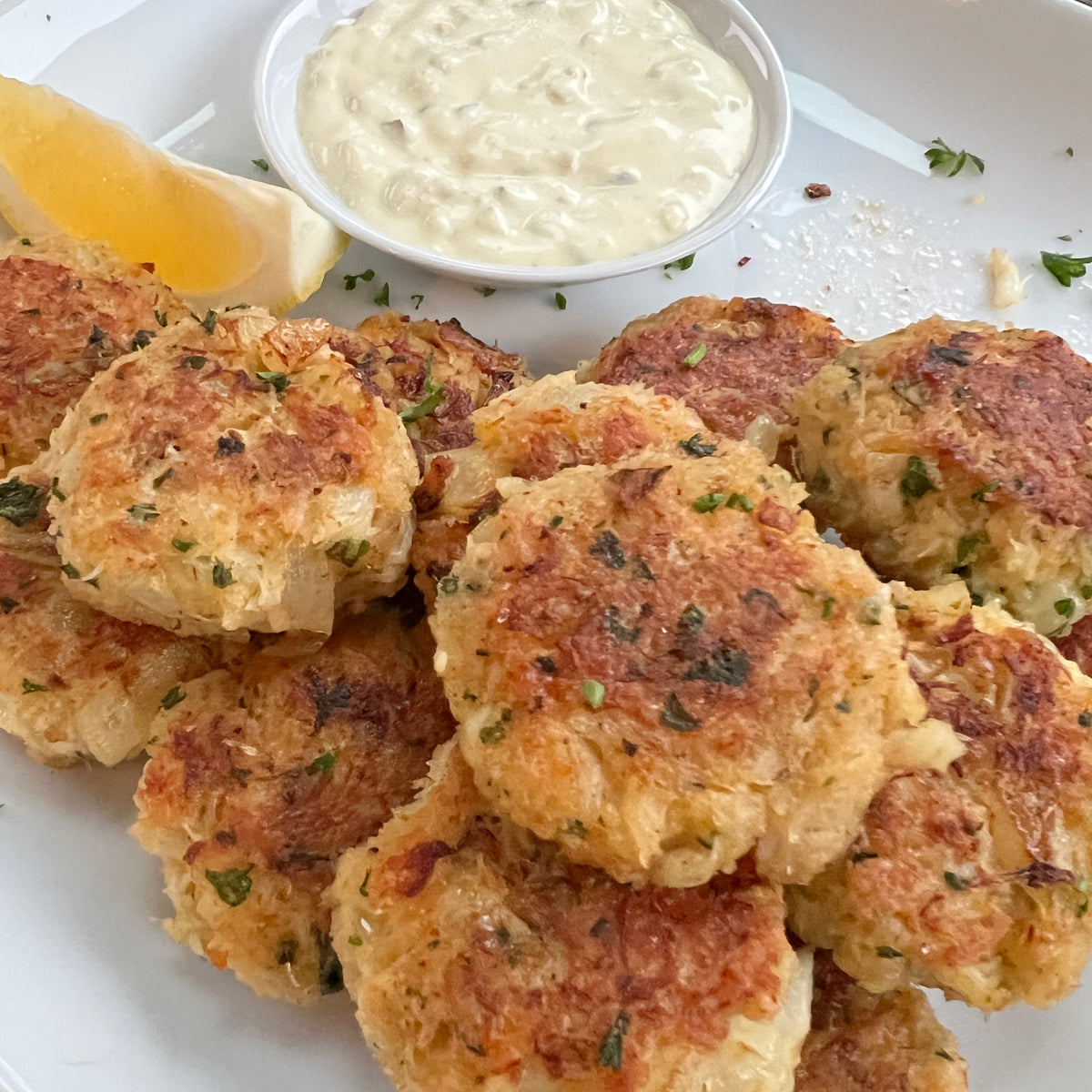 Dungeness crab cakes with lemon and aioli
